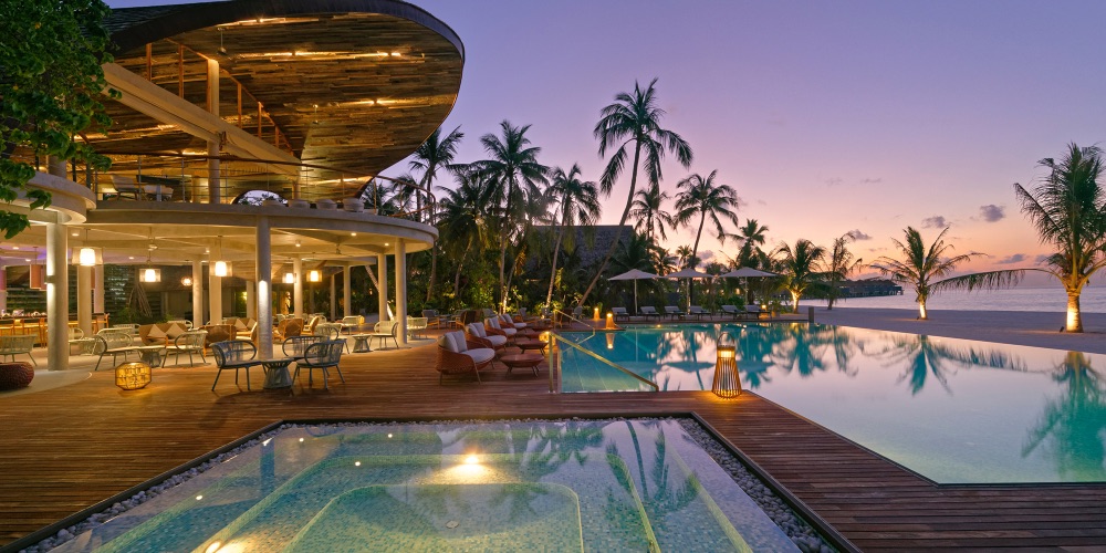 Outrigger-Maafushivaru-Resort-Pool-Night