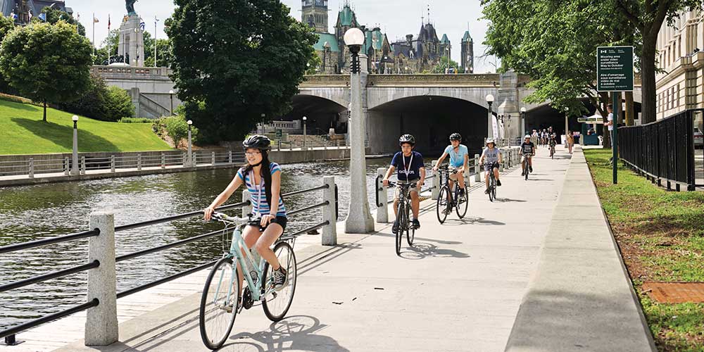 family-cycling-along-the-rideau-canal-canada-summer-2022