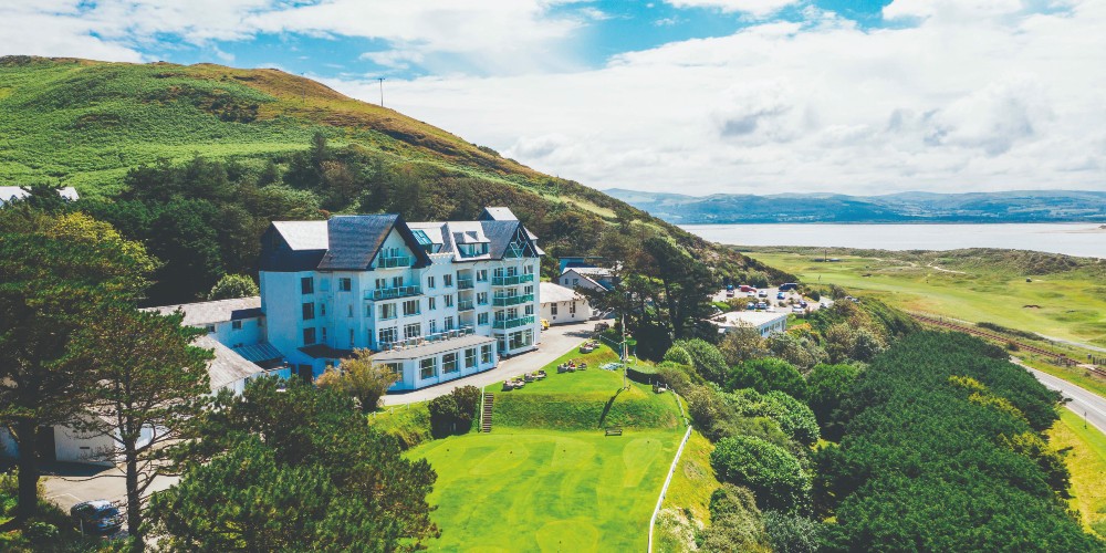 trefeddian-hotel-aberdovey-wales-exterior-mountains-coast-family-traveller-accommodation-guide-2022