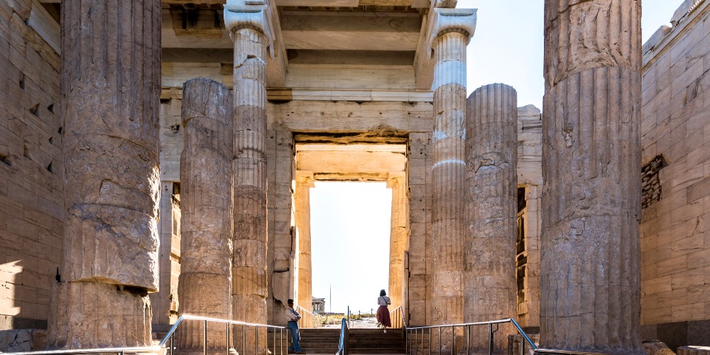 woman-exploring-acropolis-athens-family-holidays-educational-greece-2022