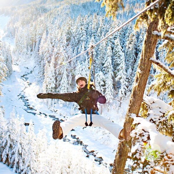 ziplining-snowy-forest-whistler-bucket-list-canada