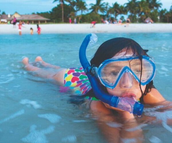 girl-snorkeling-naples-visit-florida