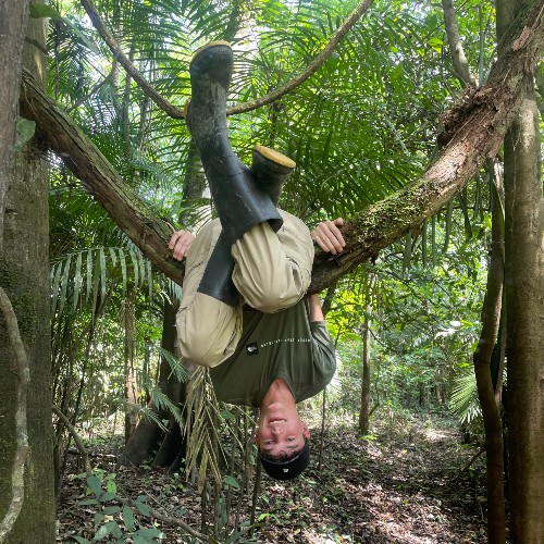 boy-hanging-upside-down-in-tree
